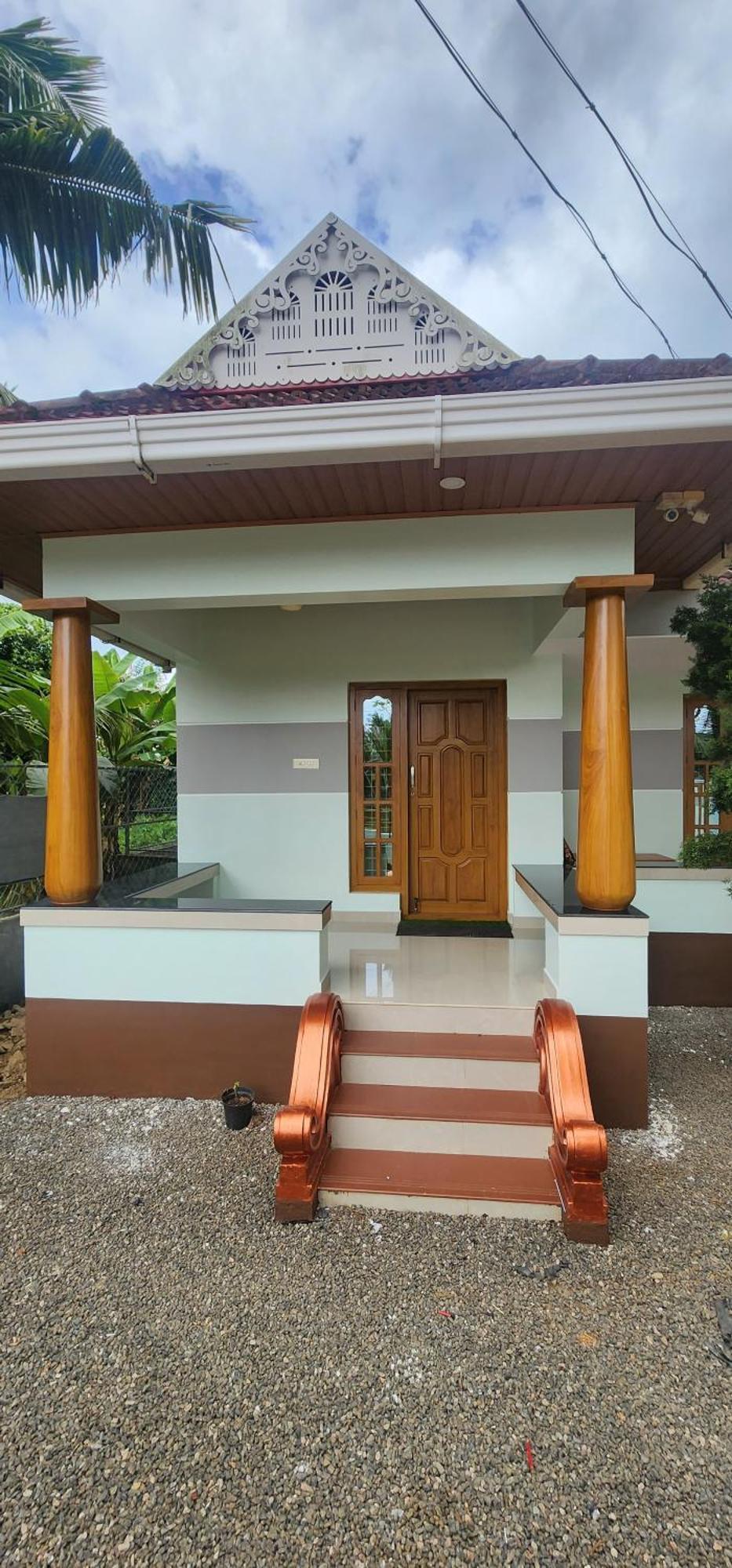 Punerjeni Homes Alappuzha Buitenkant foto