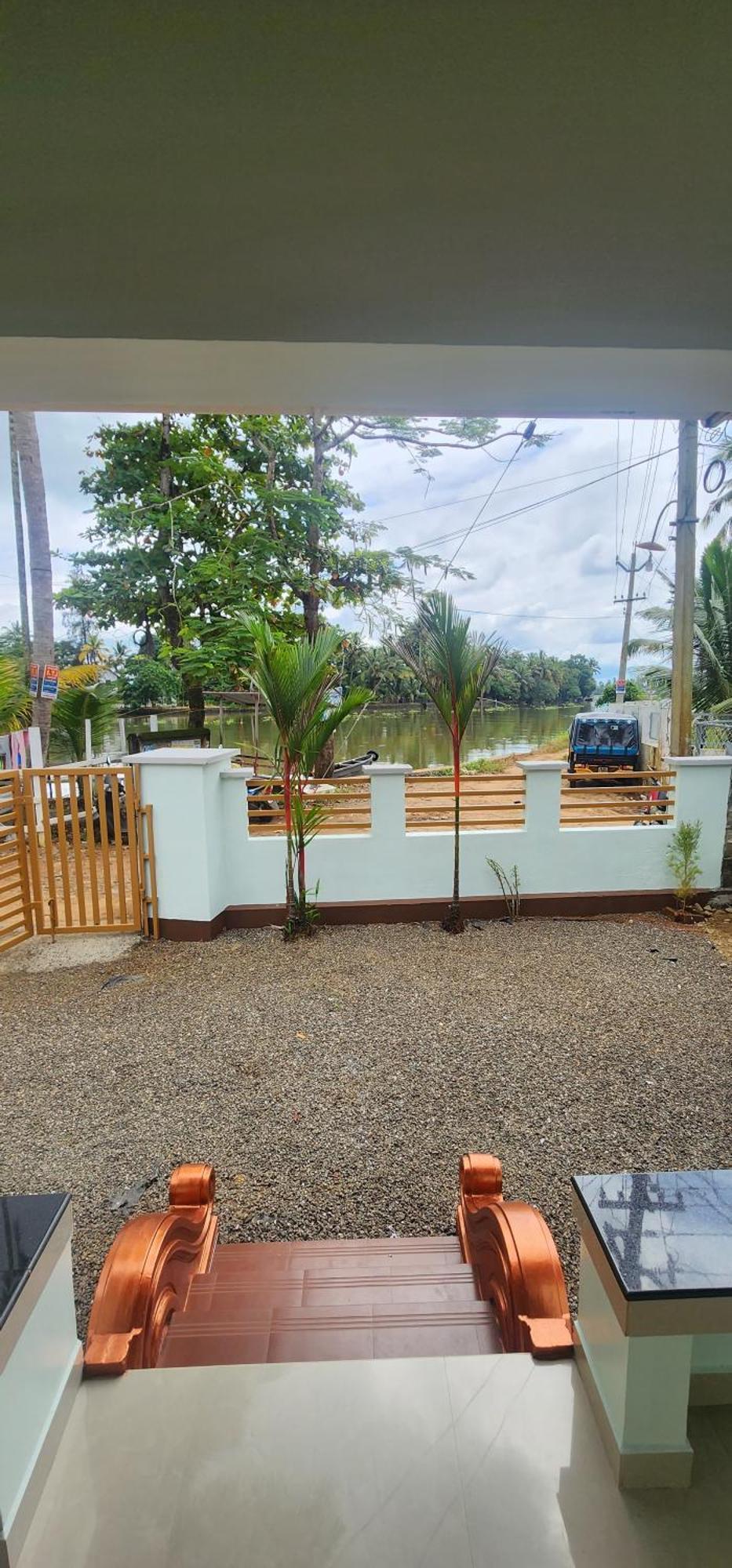 Punerjeni Homes Alappuzha Buitenkant foto